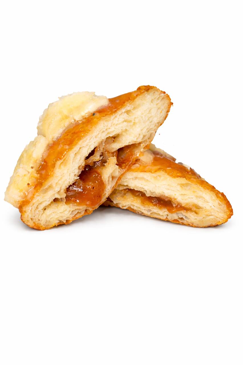 Banana's Foster stuffed beignet - Caramelized bananas with rum sauce, a New Orleans classic